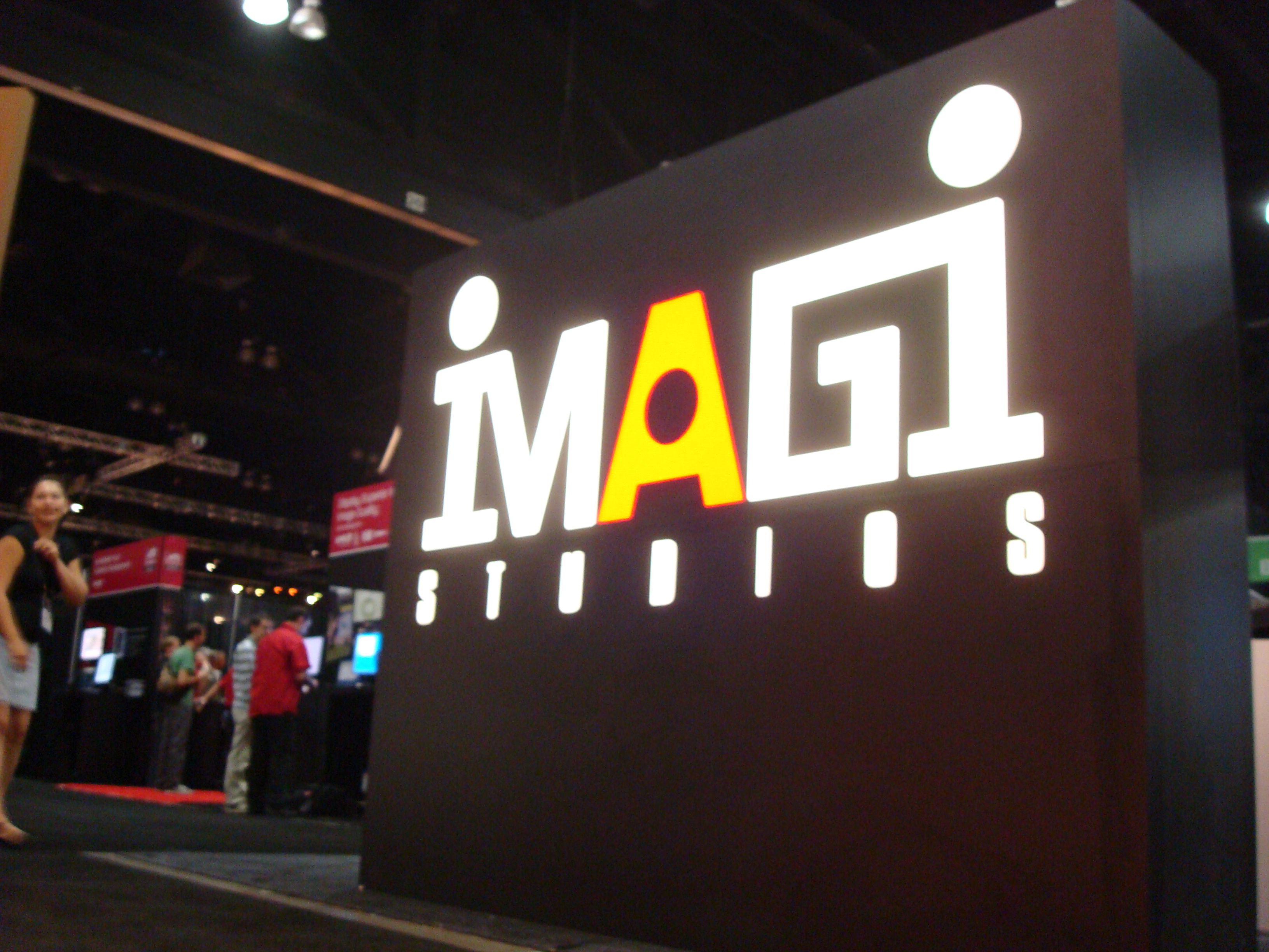 MAGI logo booth