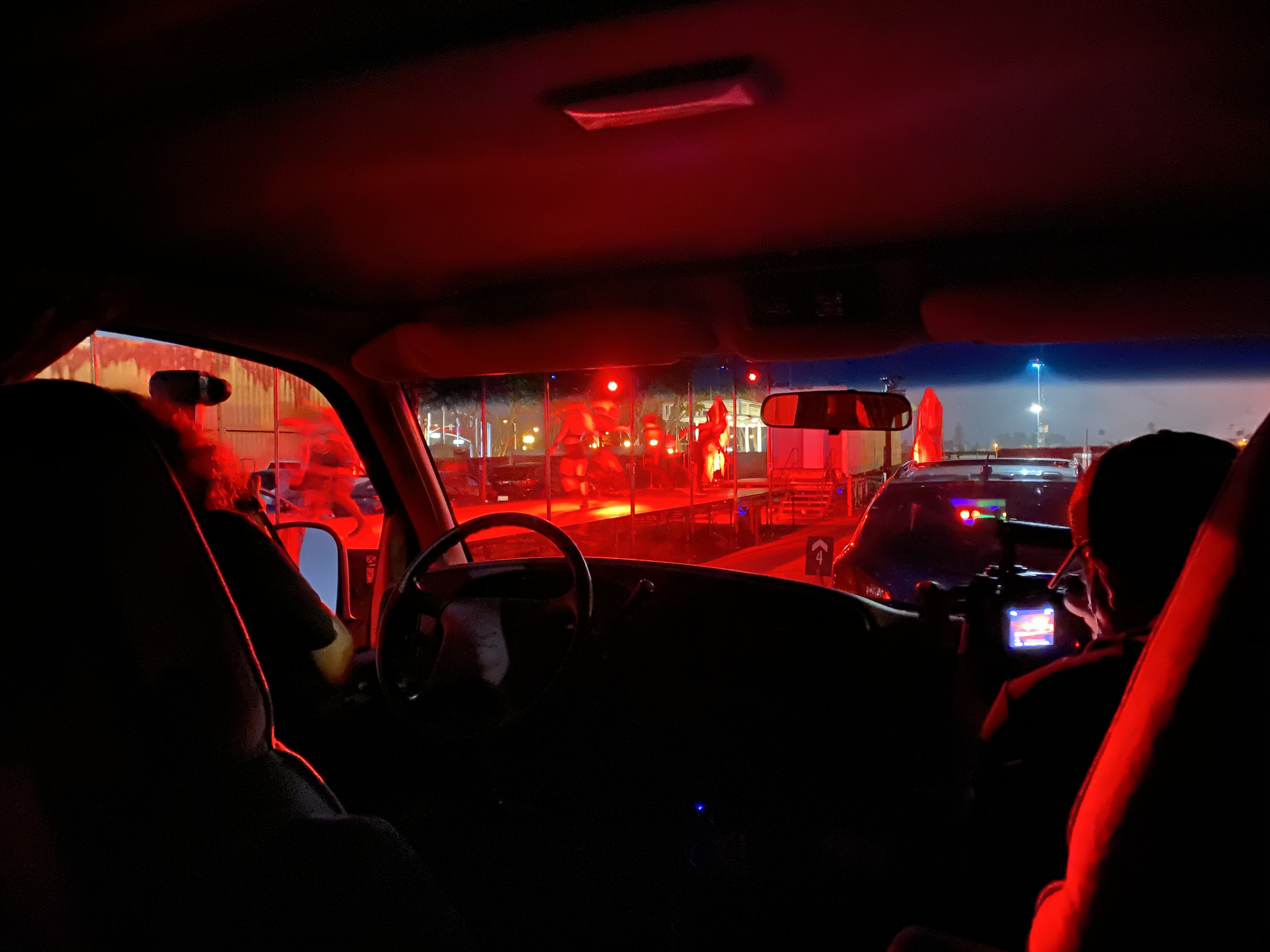Red-lit car at night