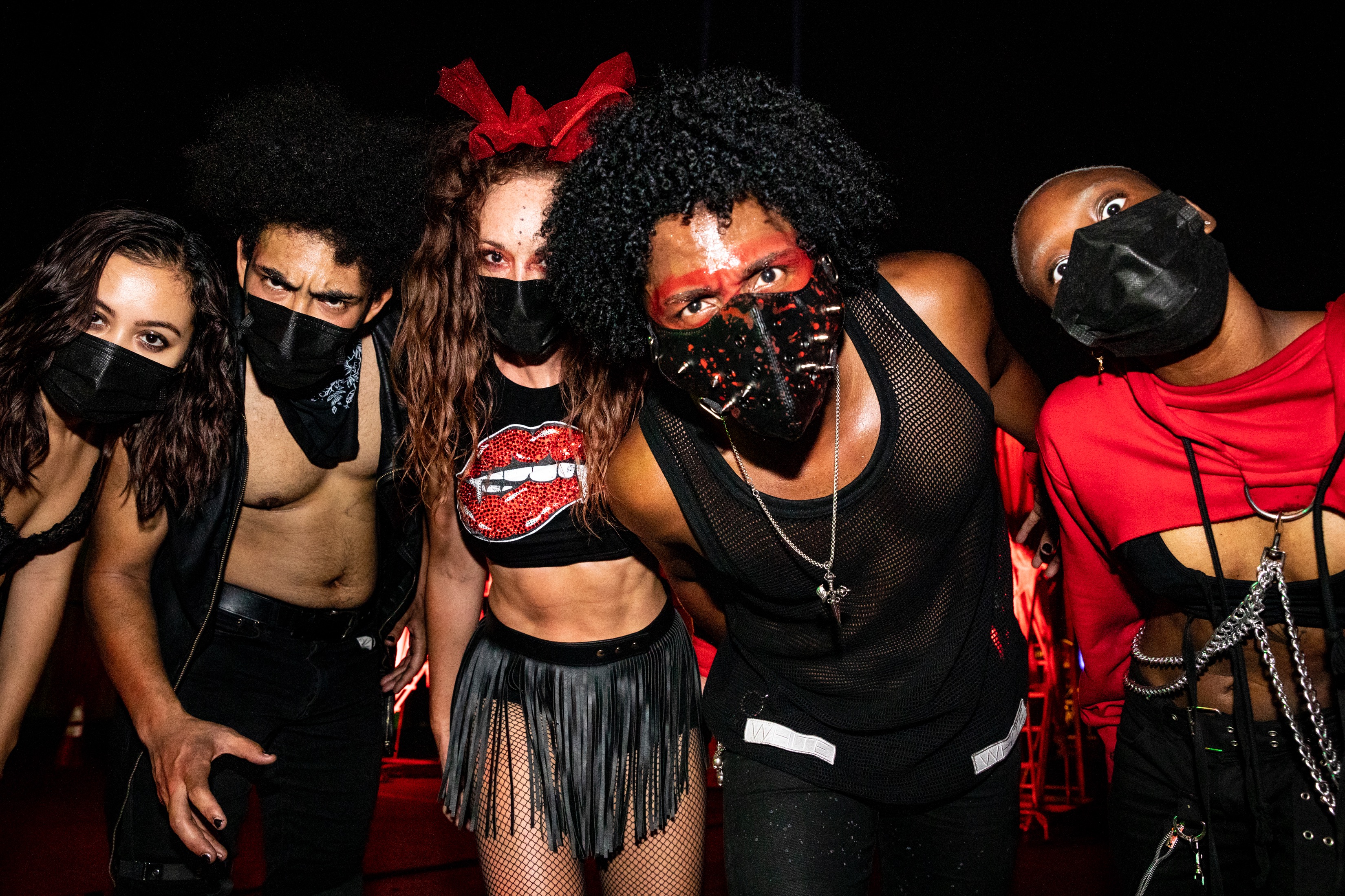 Group of performers in black