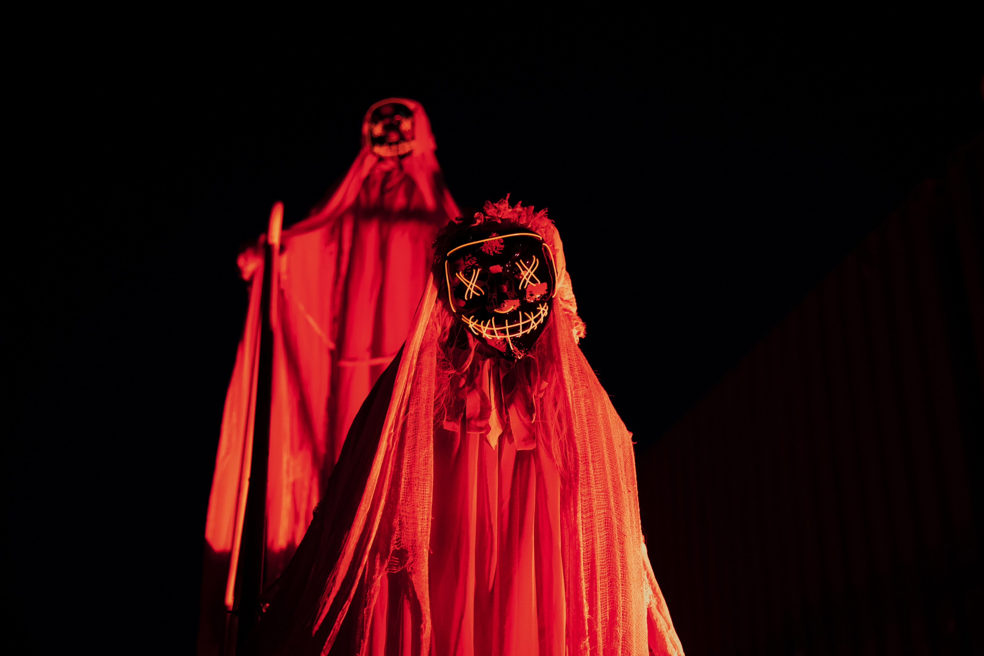 Red hooded figure